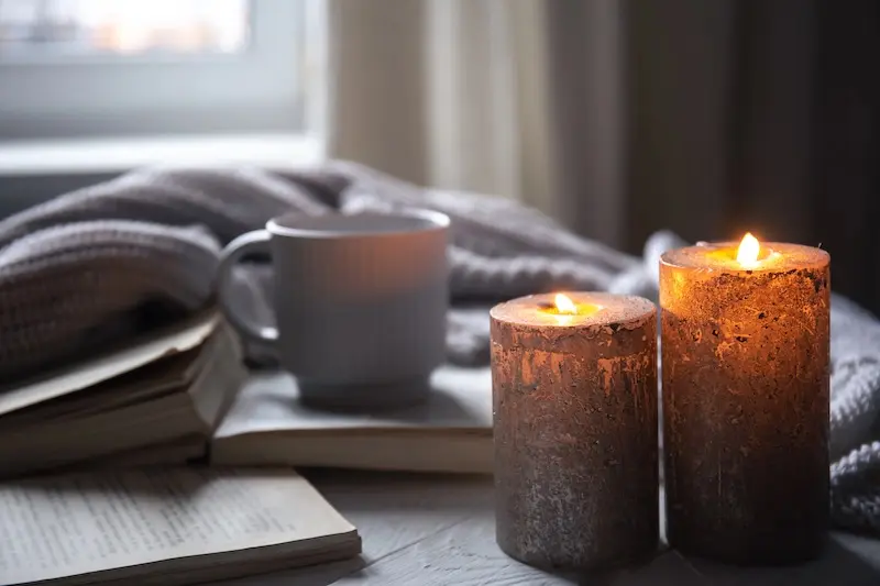 Person walking along a green path, taking small steps forward, symbolizing gradual progress and stretching comfort zones