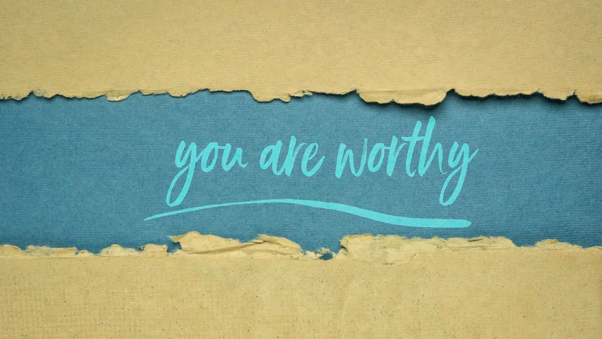 Nervous woman at grand piano, covering her face with her hand, depicting stage fright and performance anxiety